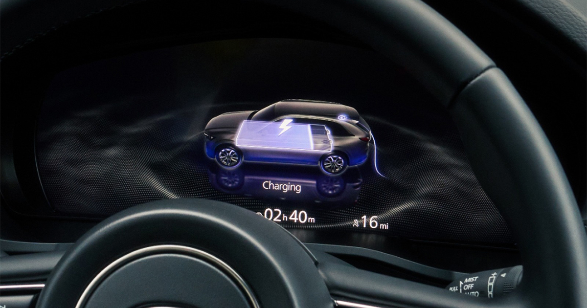 Mazda CX-90 digital gauge cluster showing EV charging status