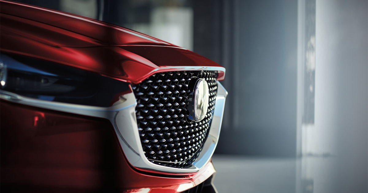 Close-up of Mazda CX-30 front grille and headlight detail